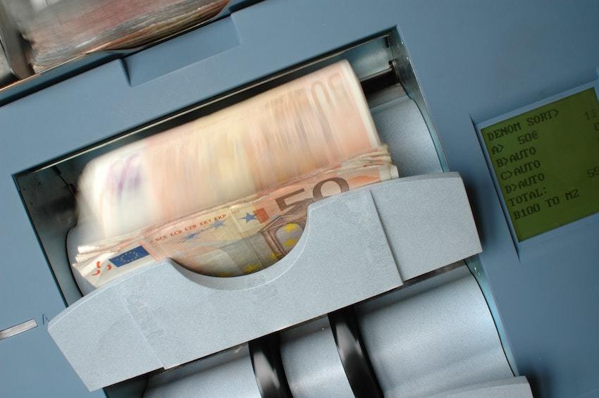 Euros in a bank machine, representing seller financing