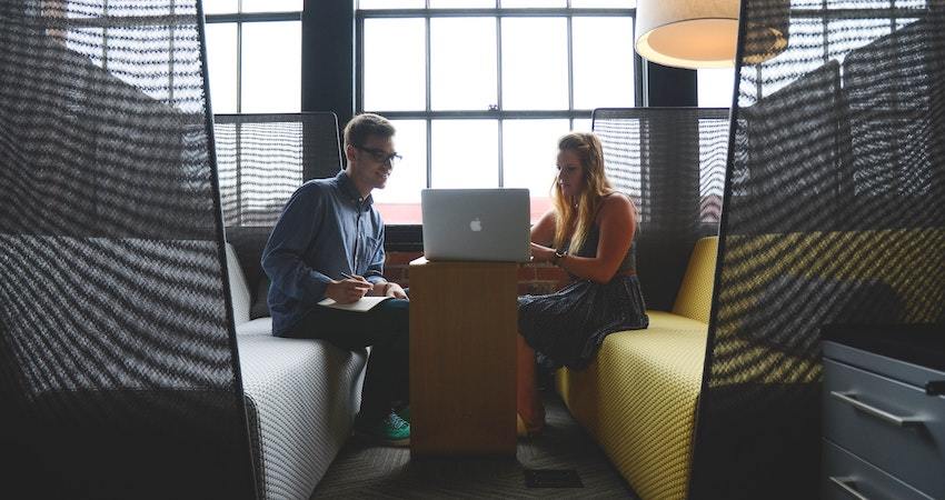 a financial advisor meets their client, representing fiduciary obligations