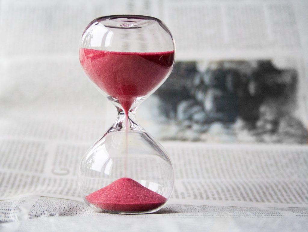This hourglass with red sand represents the importance of time for fraud statute of limitations