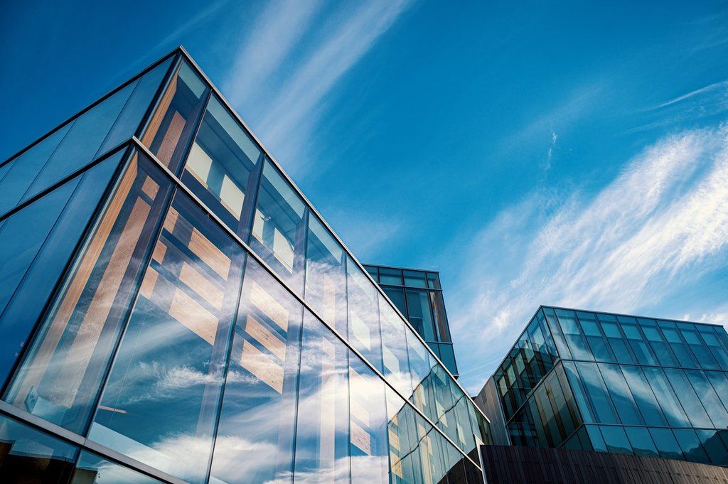 photo of glass buildings, representing how to find the cap rate formula